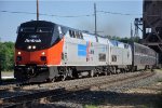 Eastbound "Empire Builder" comes off the bridge behind the Phase I Heritage unit